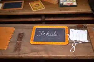 Old school desk with chalkboard